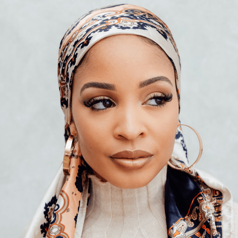 Premium Photo | A woman wearing a hijab and a gold hoop earrings